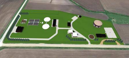 Aerial view of a rectangular plot of land with green fields and several structures, including round and rectangular buildings, pathways, and trees. The area is bordered by roads and fields.