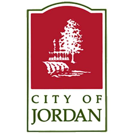 Red logo with a white tree and river, City of Jordan