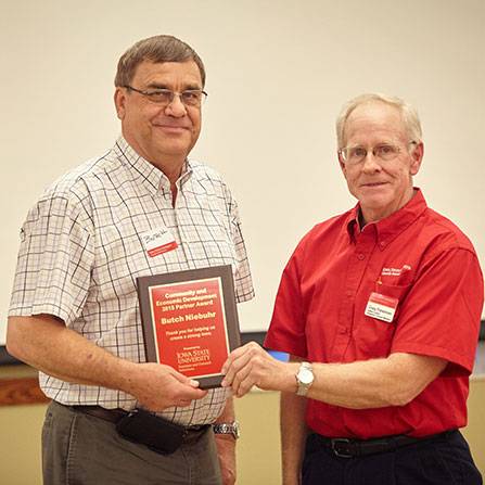 Butch Niebuhr receiving an award