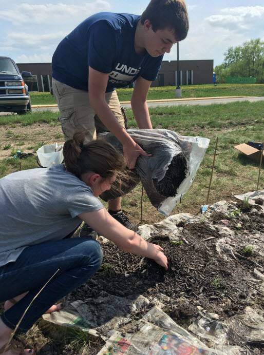 students planting
