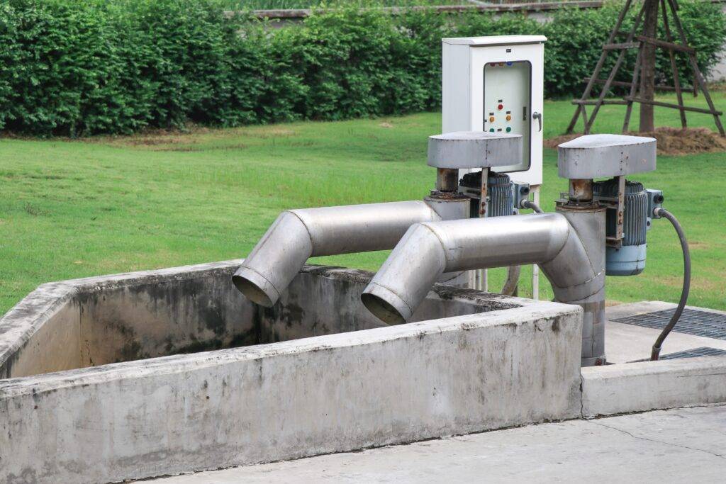 Water pumps that use sensors to drain water holding areas