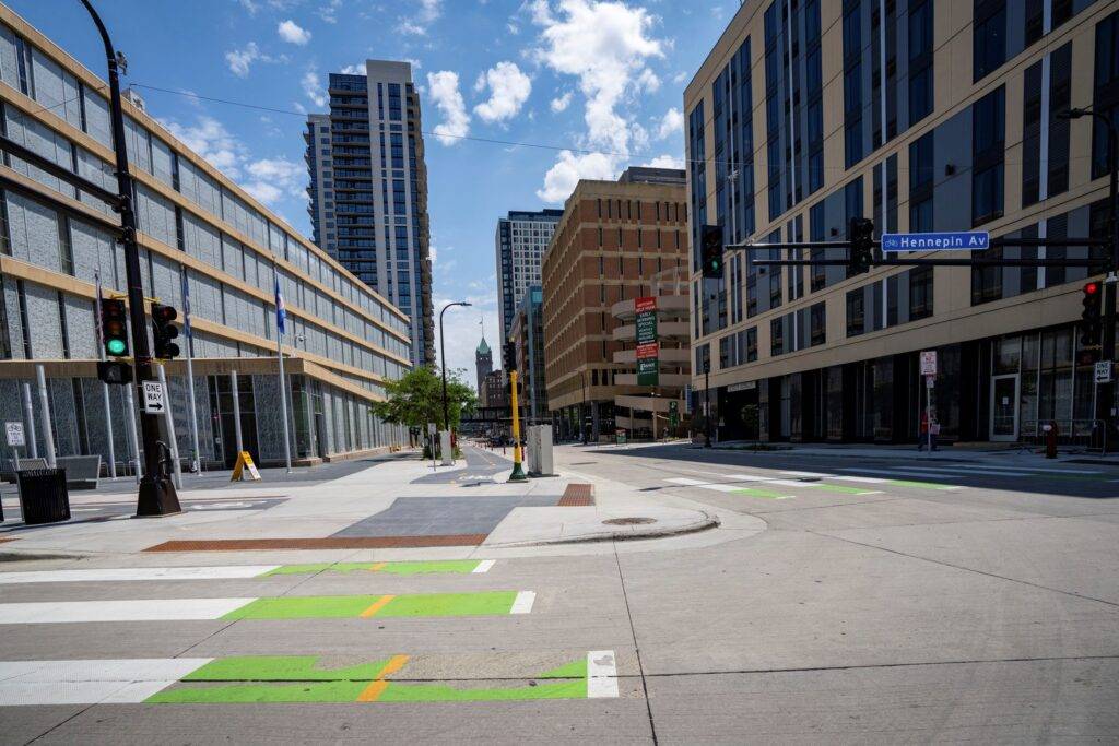 Connecting the two-way 4th Street and one-way Hennepin Ave separated bike lanes as a cohesive intersection