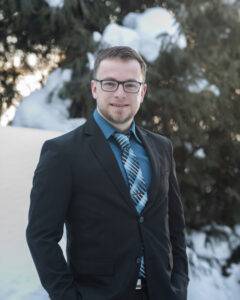 Man in suit smiling at camera