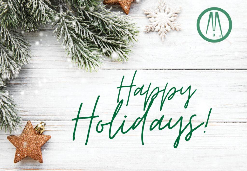 Festive greeting card featuring snow-dusted pine branches, golden star ornaments, and a snowflake on a white wooden background. Happy Holidays! is elegantly written in green text with a round green logo adorning the top right corner.