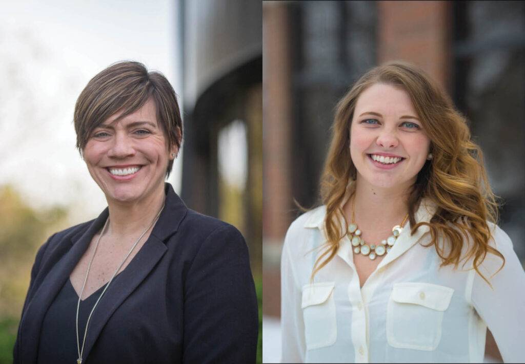 Two women standing outside smiling