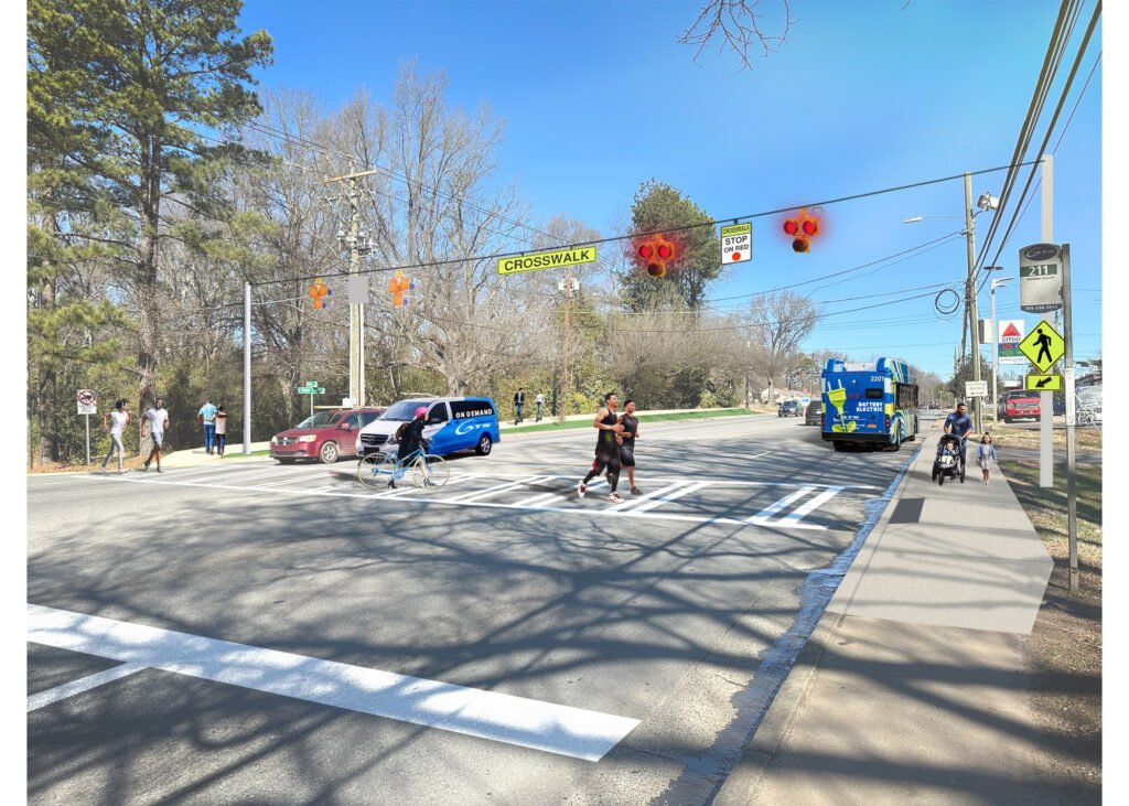 people walking and biking on a street