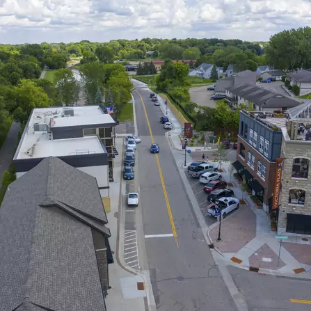 Overhead view of downtown with sidewalks and off-street parking