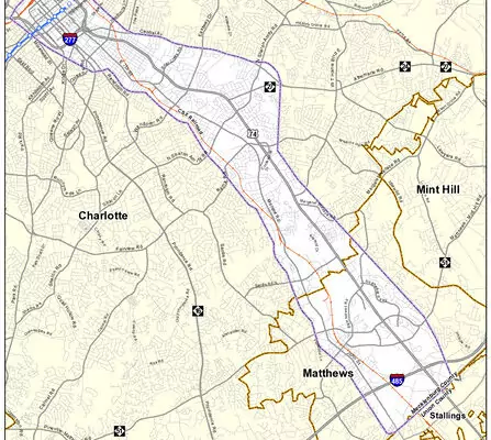 Map showing the Charlotte to Matthews area in North Carolina, highlighting road networks like Interstate 277 and 485. Surrounding areas include Mint Hill and Stallings, with geographical boundaries outlined and significant roads marked.