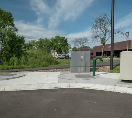 Sewer pipes and utility boxes seen outside a building