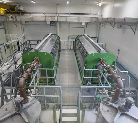 Interior of water treatment facility with multiple water tanks