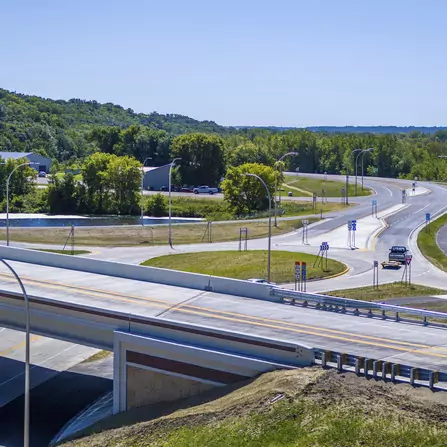 Highway with a roundabout exit in the background
