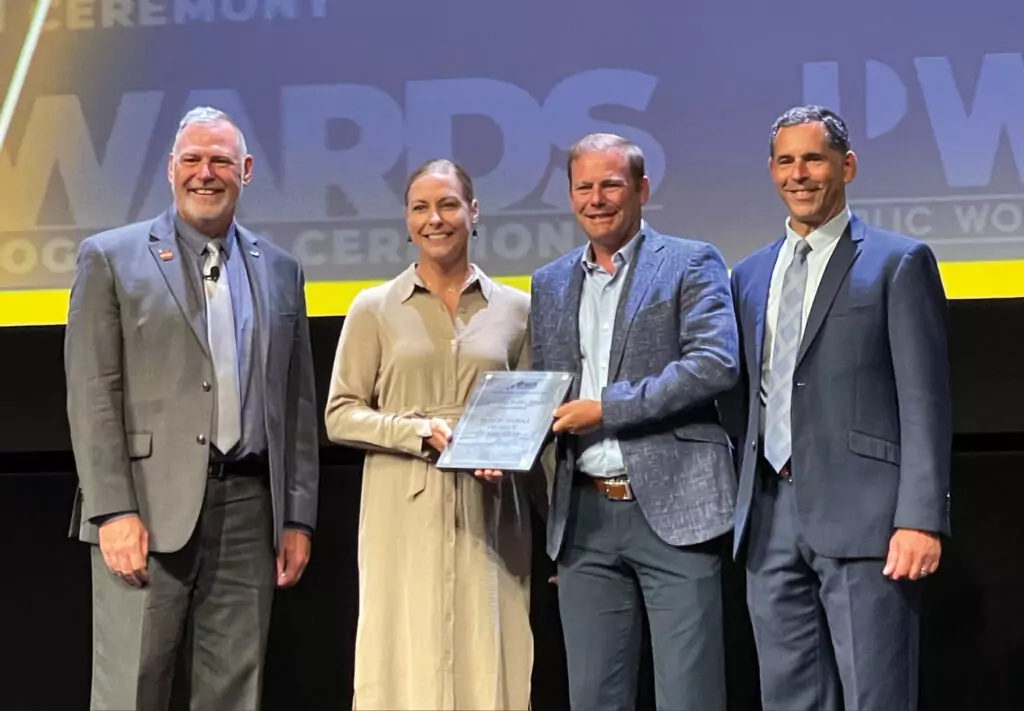 Anne Gode and Todd Hubmer accepting City of Pine River APWA Project of the Year Award