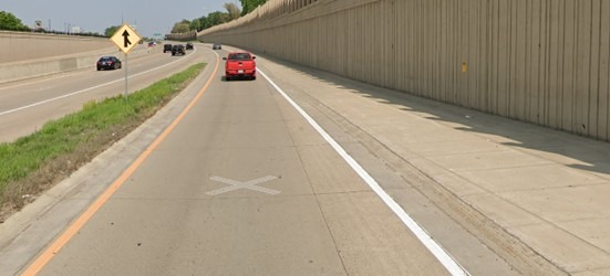 on ramp with a red car