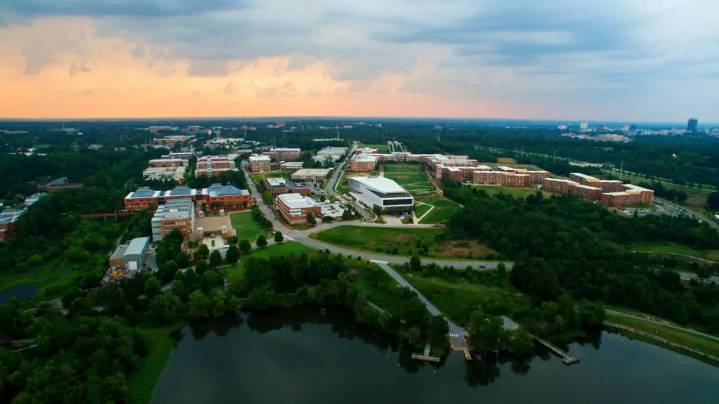 Aerial view of campus facility buildings and grounds.