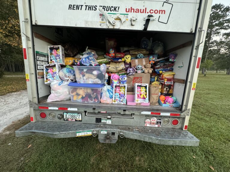 A U-Haul truck with toy donations