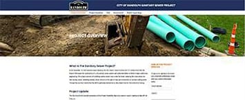 The City of Dearborn, East Dearborn Sewer Project page offers details on this important public project. Featuring an image of construction equipment and blue pipes, it includes a header menu and comprehensive content detailing the projects overview.