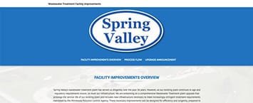 Screenshot of a webpage with a blue header featuring the Spring Valley logo in a white oval. Below, text highlights the Facility Improvements Overview and details ongoing public projects.