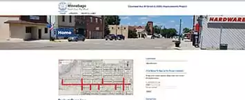 A webpage showcases a street view of a small town with a Home button overlay. Below, a map highlights routes with red lines, illustrating areas of interest for public projects. This page is part of an ongoing road replacement initiative.