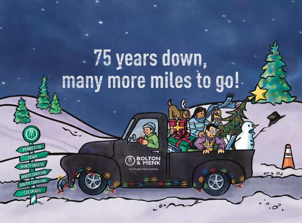 An illustrated black truck with people in it driving down a snowy road