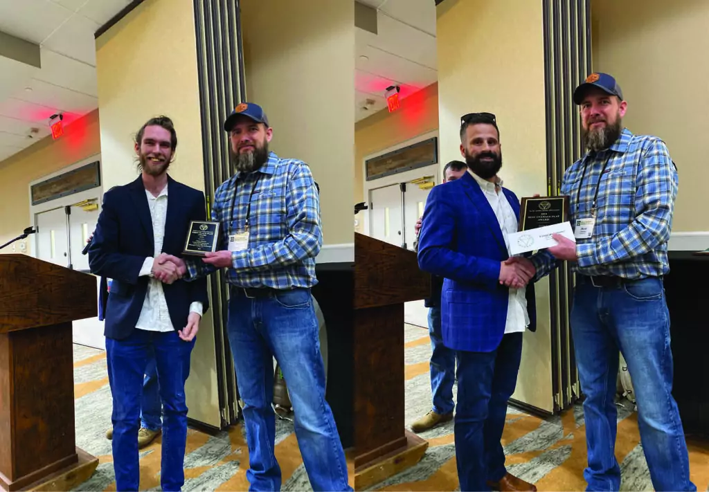 Two men wearing blue blazers accepting awards