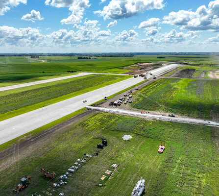A new runway being constructed with equipment working