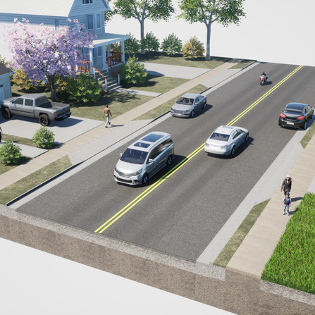 A road with cars and houses