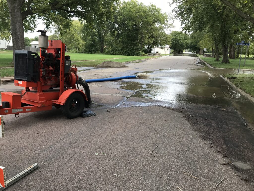 A machine performing disaster recovery on a residential road