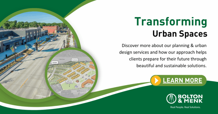 A promotional banner for Bolton & Menk featuring a street with shops, an urban plan map, and text about transforming urban spaces through Community Revival and sustainable solutions. A green Learn More button is displayed.