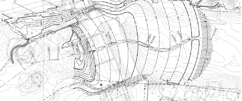 Black and white site plan with contour lines, labeled plots, boundaries, and elevation markers illustrates land divisions and topography for a development project focused on reestablishing the river. Various lines and shapes indicate slopes and plot layouts.