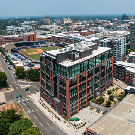 A high angle view of an apartment complex in an urban, downtown city