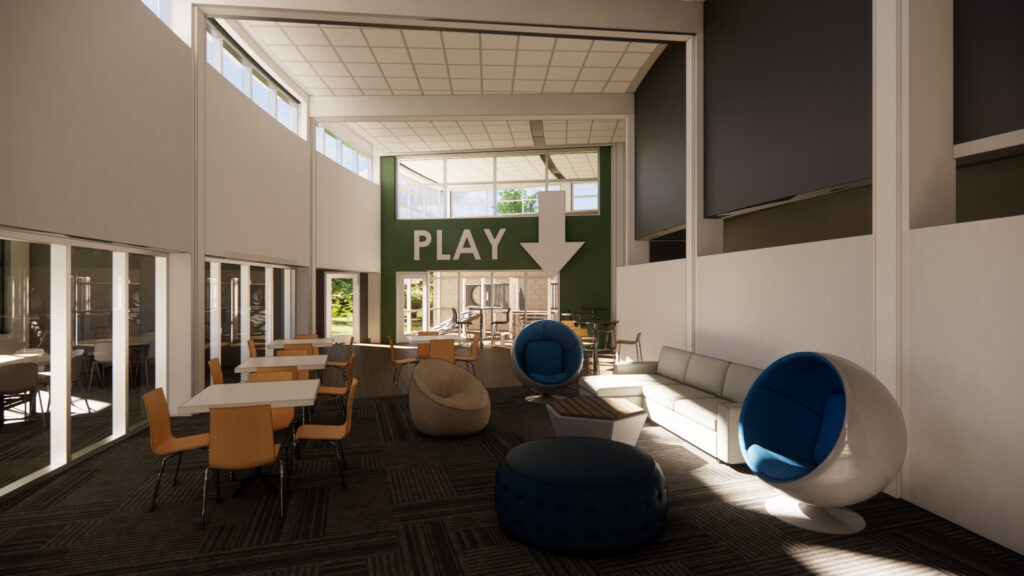 Modern indoor lounge with tables, chairs, and unique egg-shaped seats. Large windows let in natural light. A green wall with a large PLAY sign and arrow points toward a play area in the background.