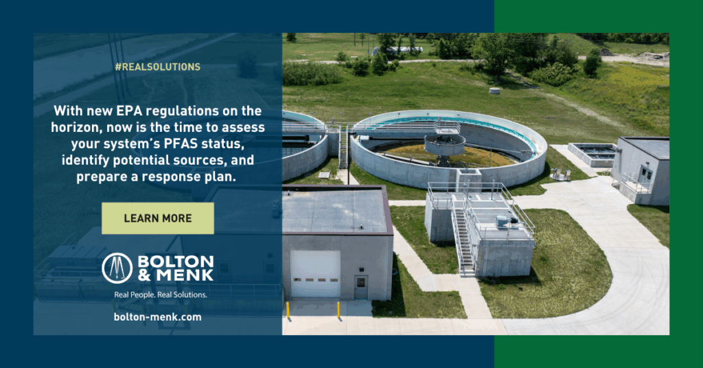 Aerial view of a water treatment facility with circular tanks and adjacent buildings, overlaid with text about assessing PFAS status and exploring PFAS Solutions due to new EPA regulations. A Learn More button and Bolton & Menk logo appear in the foreground.