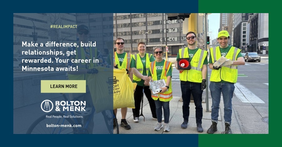 Five people wearing yellow safety vests and sunglasses stand on a city sidewalk, holding trash bags and cleanup tools. Text invites viewers to build a career with Bolton & Menk.